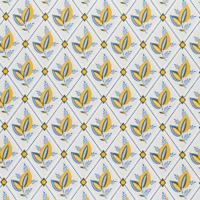 Basile Trellis wallpaper in yellow and blue, a leafy lattice geometric print by Schumacher, shown in a styled bathroom interior.