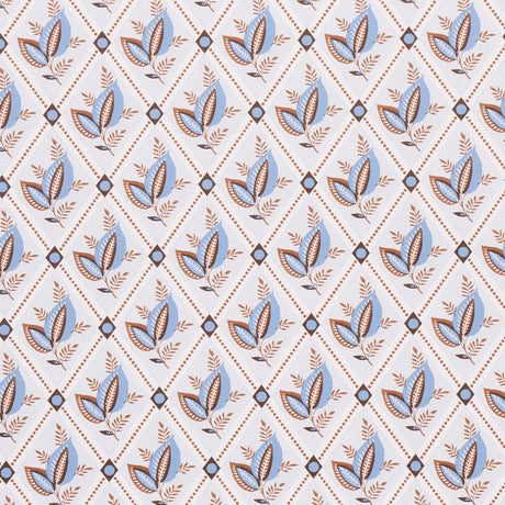 Basile Trellis wallpaper in Delft & Sepia by Schumacher, a leafy lattice geometric print in blue and brown tones, shown in detail and installed in a bathroom.