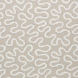 Zoelie wallpaper in natural by Schumacher features a modern vermicelli motif in a neutral colorway, ideal for adding playful texture to any room.
