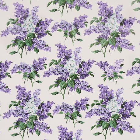 Proust's Lilacs wallpaper by Schumacher, featuring large-scale purple lilac floral clusters with green leaves on a light background, designed by Johnson Hartig.