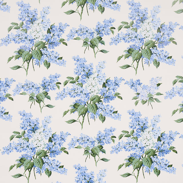 Proust's Lilacs blue floral wallpaper by Johnson Hartig for Schumacher, large-scale botanical pattern