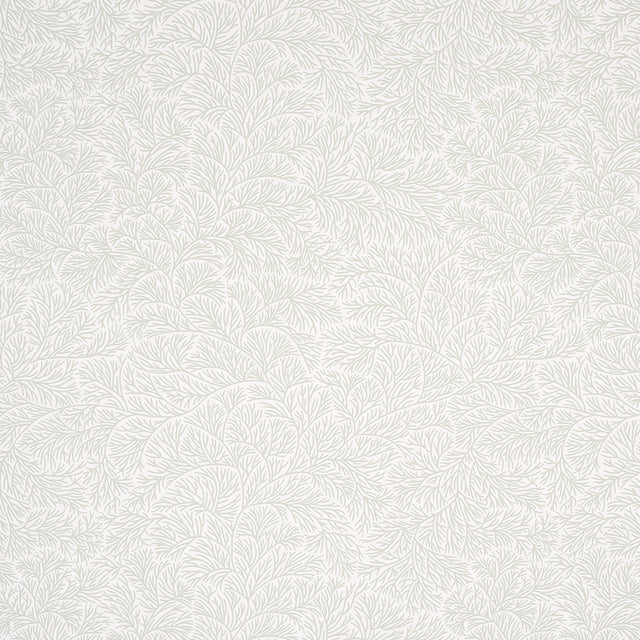 Bougainvillea Leaf Green wallpaper by Schumacher in a bedroom setting, featuring a delicate botanical pattern.