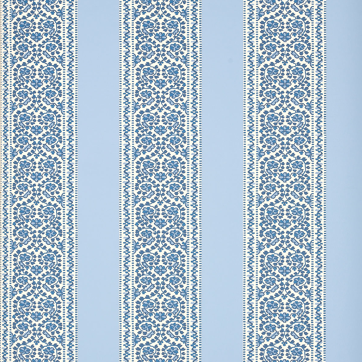 JASMINE Indigo wallpaper by Schumacher featuring a blue and white floral stripe pattern, shown in a styled interior and product detail shots.