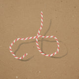Butcher String Red and White on Brown by Charlap Hyman & Herrero Wallpaper – Schumacher 5014471