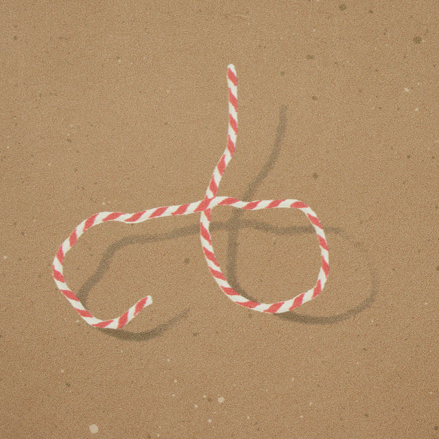 Butcher String Red and White on Brown by Charlap Hyman & Herrero Wallpaper – Schumacher 5014471