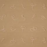 Butcher String wallpaper by Charlap Hyman & Herrero for Schumacher, featuring red and white twine on a brown background.
