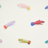 Manos wallpaper by Schumacher featuring multi-colored disembodied hands on an ivory background, designed by Charlap Hyman & Herrero.