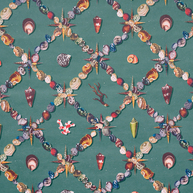 Grotto Treillage wallpaper in multi on teal, featuring a playful collage of shells and marine motifs arranged in a trellis pattern by Charlap Hyman & Herrero for Schumacher.