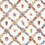 Grotto Treillage wallpaper by Schumacher featuring a playful collage of shells and marine curiosities in a trellis pattern, multi on ivory.