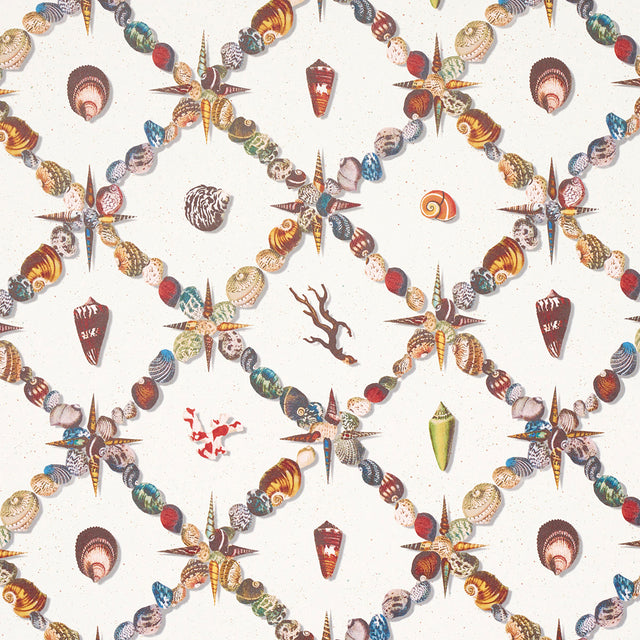 Grotto Treillage wallpaper by Schumacher featuring a playful collage of shells and marine curiosities in a trellis pattern, multi on ivory.
