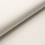 Ivory Belgian linen-look wallcovering with subtle texture, styled in a serene interior setting.