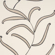 Caterpillar Leaf wallpaper in black and cream by Neisha Crosland for Schumacher, featuring whimsical botanical leaves inspired by antique Indian crewelwork.