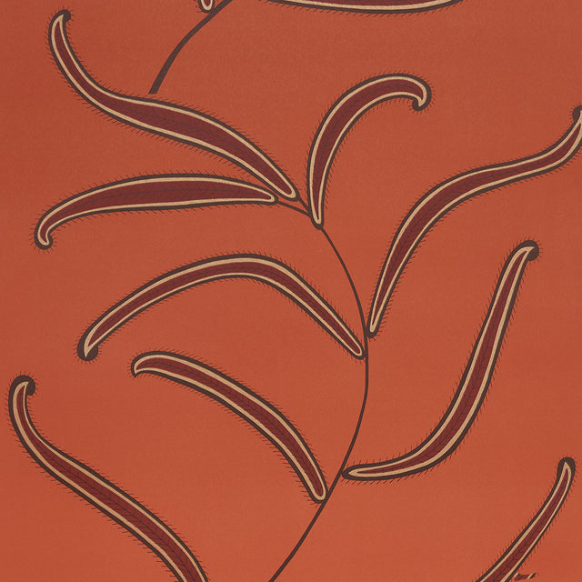 Caterpillar Leaf wallpaper in Tomato by Neisha Crosland for Schumacher, featuring whimsical botanical leaves on a bold red-orange background.