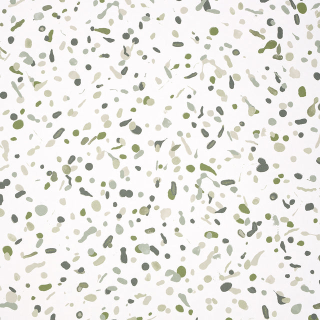 LOS COSMOS Moss by Backdrop for Schumacher. Abstract green paint splatter wallpaper on white background, shown in styled interior and close-up views.