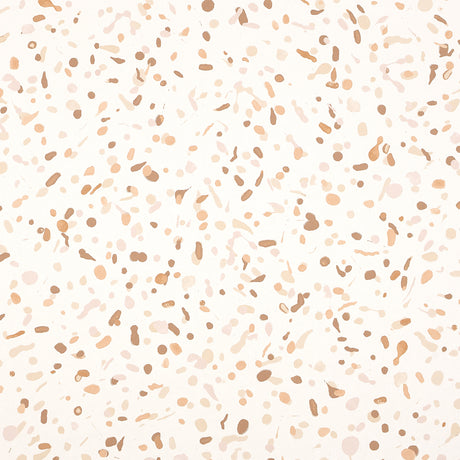 Los Cosmos Earth wallpaper by Schumacher features a dynamic allover pattern of random multidirectional paint splatters in earth tones.