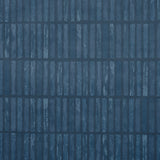 Wabi-Sabi dark blue geometric grid wallpaper by Schumacher, hand-painted look, styled in a modern kitchen interior.