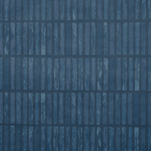 Wabi-Sabi dark blue geometric grid wallpaper by Schumacher, hand-painted look, styled in a modern kitchen interior.