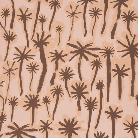 PALMITAS wallpaper in coral by Abel Macias for Schumacher, featuring hand-painted palm tree motifs in a painterly, tropical style.