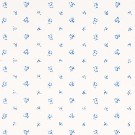Margie Floral Porcelain wallpaper by Schumacher, featuring a delicate blue rosebud pattern on a white background.