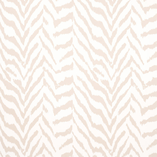 Quincy Natural wallpaper by Schumacher featuring a subtle animal-inspired pattern in neutral tones, styled in a classic interior setting.