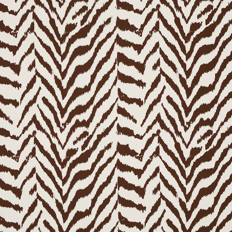 Quincy Cocoa animal print wallpaper from Schumacher's Moon River collection, shown in a styled interior and close-up detail.