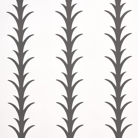 Acanthus Stripe wallpaper in carbon on ivory by Schumacher, featuring a stylized acanthus leaf stripe pattern in a modern interior setting.