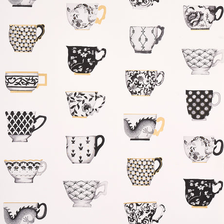 Onie's Teacups wallpaper in Ink by Schumacher, featuring hand-painted porcelain teacups with chinoiserie motifs in black, white, and gold.