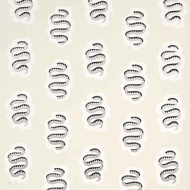 ELSA Sandstone wallpaper by Schumacher featuring a whimsical snake motif on a neutral background, shown in various interior settings.