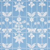Georgia Wildflowers blue botanical wallpaper by Schumacher, featuring stylized white wildflowers on a blue background.