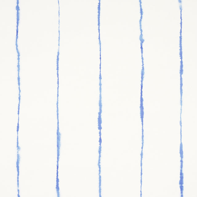 Ephemera Cornflower by Backdrop for Schumacher - watercolor vertical stripe wallpaper in blue and white, shown in a bathroom interior and close-up views.