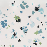 Backdrop Fairfarren Teal abstract floral wallpaper by Schumacher, shown in a modern dining room setting.