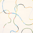 Turini by Backdrop for Schumacher. Bright multi-color abstract vermicelli motif wallpaper with meandering segmented lines on a light background.