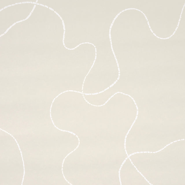 Turini Light Beige wallpaper by Backdrop for Schumacher, featuring a large-scale calligraphic vermicelli motif in a neutral palette.