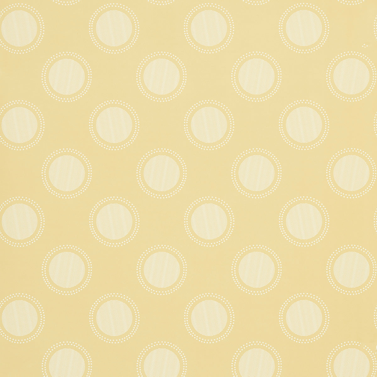 Watermark wallpaper in Corn by Neisha Crosland for Schumacher, featuring graphic ringed polka dots with a moiré effect.