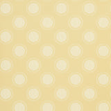 Watermark wallpaper in Corn by Neisha Crosland for Schumacher, featuring graphic ringed polka dots with a moiré effect.