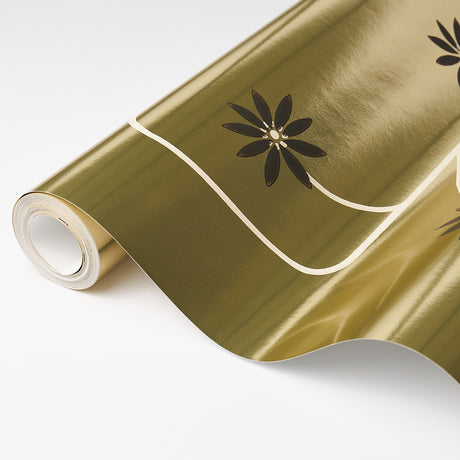 Hollywood Grape wallpaper in pale gold by Neisha Crosland for Schumacher, featuring a large-scale botanical and geometric fruit vine pattern on a shimmering metallic ground.