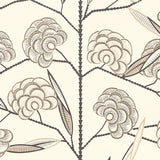 Jacob's Tree wallpaper by Neisha Crosland for Schumacher in black and cream, featuring a modern take on a traditional tree of life pattern with stylized magnolia blossoms.