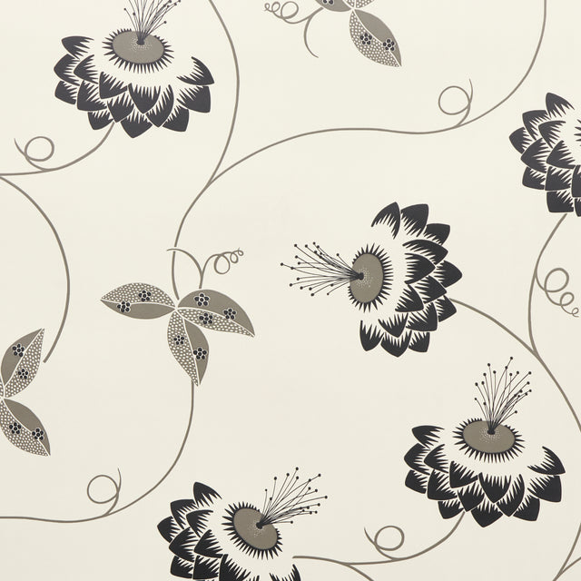 Merlin wallpaper by Neisha Crosland for Schumacher in black and cream, featuring a modern Art Deco-inspired climbing floral pattern.