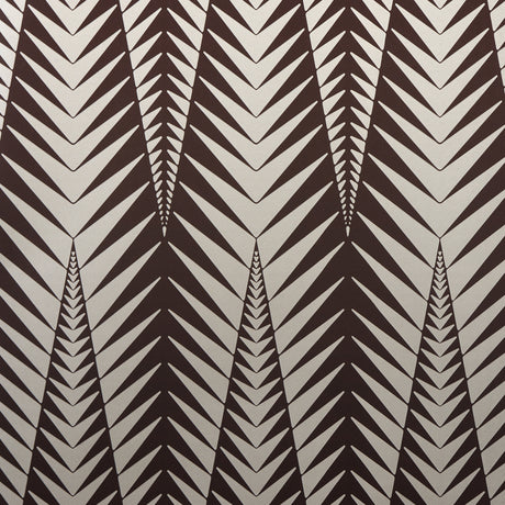Zebra wallpaper in brown and silver by Neisha Crosland for Schumacher, featuring a bold abstract animal-inspired geometric pattern.