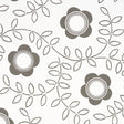 TUDOR ROSE wallpaper in charcoal and white by Schumacher, featuring a bold floral and leaf pattern designed by Neisha Crosland.