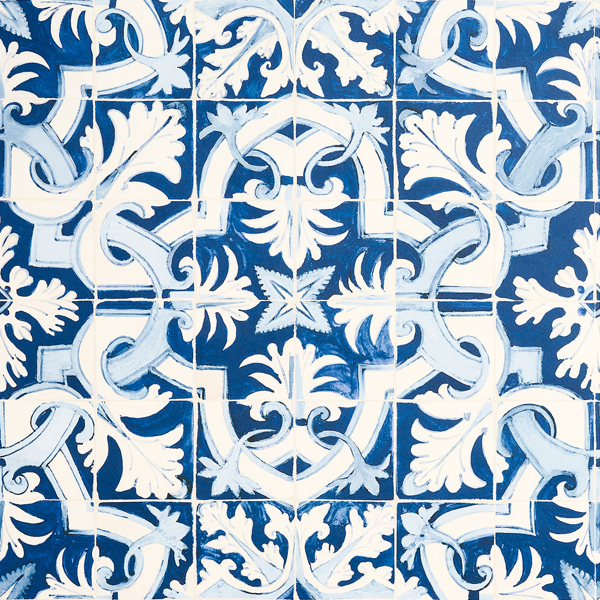 Azulejos wallpaper in azure blue by Mary McDonald for Schumacher, inspired by antique Portuguese tiles with an intricate interlocking pattern.
