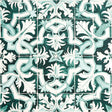 Azulejos wallpaper in Emerald by Mary McDonald for Schumacher, inspired by antique Portuguese tiles, featuring an intricate green and white interlocking pattern.