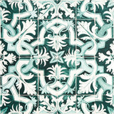 Azulejos wallpaper in Emerald by Mary McDonald for Schumacher, inspired by antique Portuguese tiles, featuring an intricate green and white interlocking pattern.