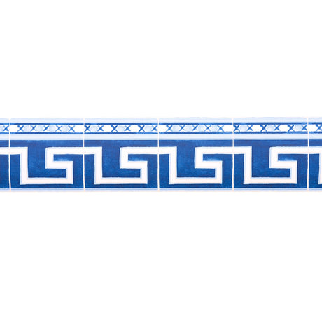 Azulejos Border wallpaper border in azure blue by Mary McDonald for Schumacher, inspired by antique Portuguese tiles with a Greek key motif.