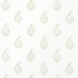 Kerala Paisley II wallpaper in Leaf by Schumacher, featuring classic tear-shaped paisleys in a small-scale green pattern on white.