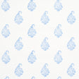 Kerala Paisley II blue paisley wallpaper by Schumacher shown in a bathroom and bedroom interior, classic handblock print style.