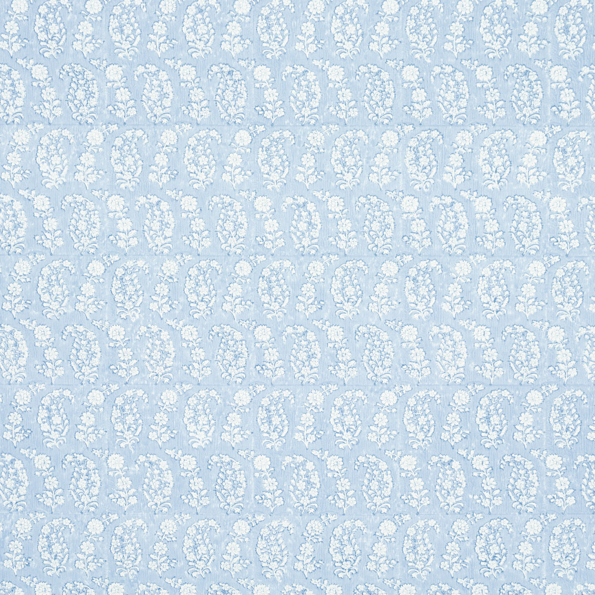 Arita Block Print wallpaper in Cornflower by Schumacher, featuring a hand-blocked paisley and floral pattern in blue and white.
