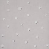Heavenly Bodies wallpaper in gray by Schumacher, featuring abstract star and cloud motifs on a soft background.