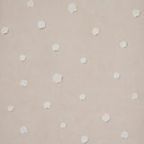 Heavenly Bodies Sand by Backdrop abstract star and cloud wallpaper on uncoated nonwoven material, shown in a modern living room setting.