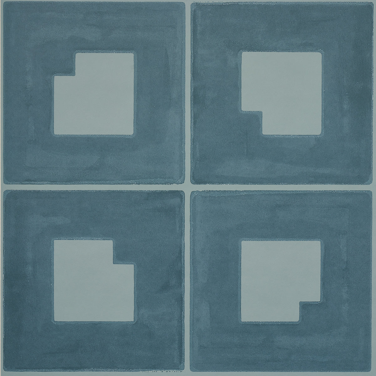 Palindrome wallpaper in teal by Schumacher, featuring a large-scale geometric grid pattern with a hand-painted effect.